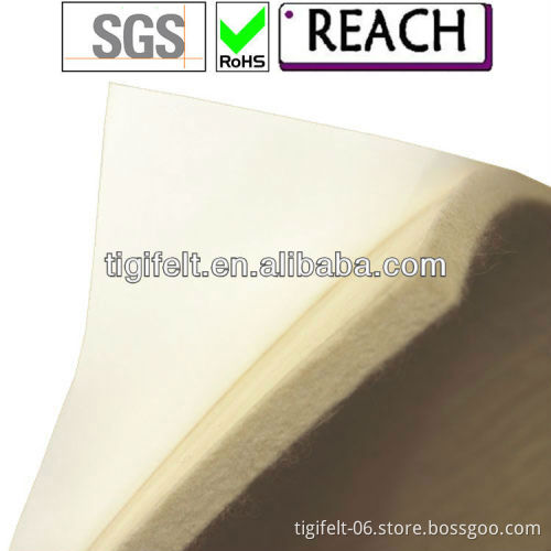 Self-adhesive wool felt with paper backing